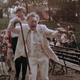 An elderly man (Lincoln Maazel) runs from a crowd in George A. Romero's "lost" film, The Amusement Park.